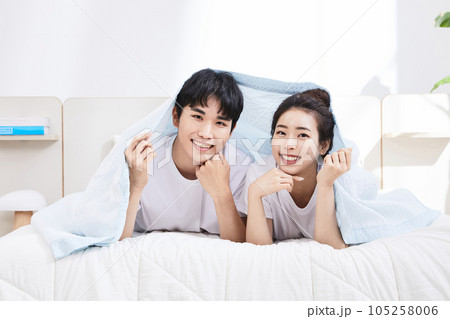 summer lifestyle, korean asian young couple with bed 105258006