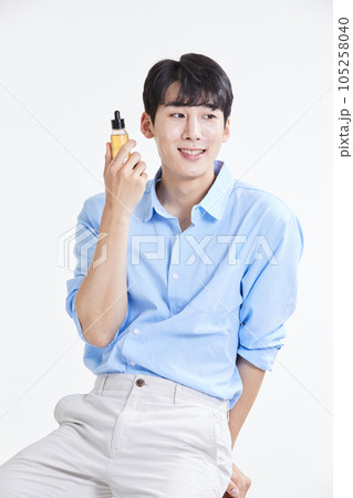 korean asian young man with skincare products 105258040