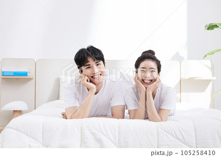 summer lifestyle, korean asian young couple with bed 105258410