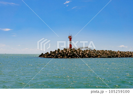 lighthouse or beacon near Sochi sea Port, Russia 105259100