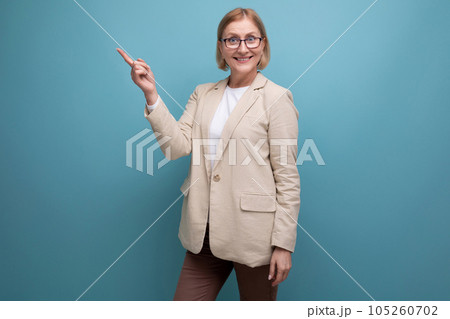 photo of a composed mature business woman in a classic jacket on a bright background with copy space photo of a composed mature business woman in a classic jacket on a bright background with copy space 105260702