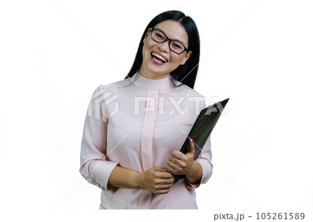 Young asian businesswoman with clipboard is laughing hard. Isolated on white. 105261589