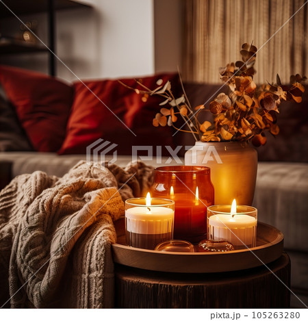 Warm cozy home interior with burning candles, afternoon room decoration, creative decor arrangement Warm cozy home interior with burning candles, afternoon room decoration, creative decor arrangement 105263280