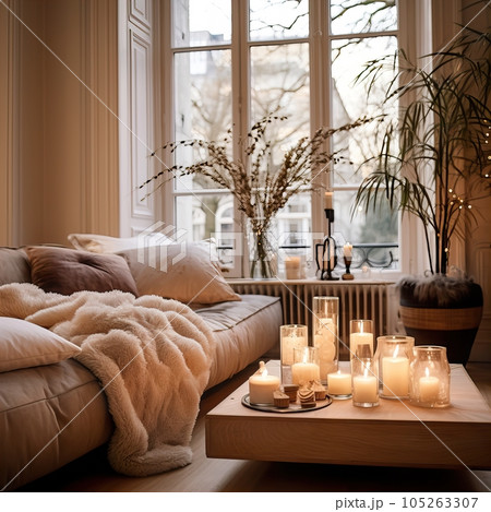 Warm cozy home interior with burning candles, afternoon room decoration, creative decor arrangement 105263307