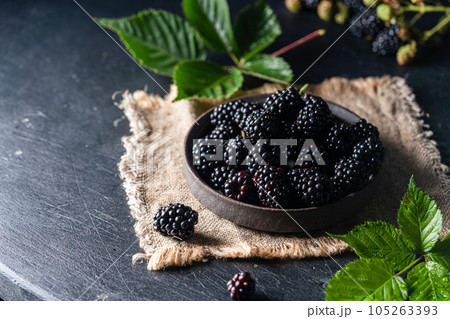 Ripe blackberries with leaves Ripe blackberries with leaves 105263393