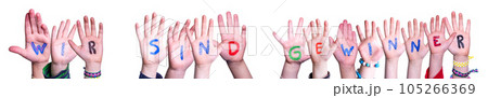 Children Hands Building Wir Sind Gewinner Means We Are Winners. White Background Children Hands Building Wir Sind Gewinner Means We Are Winners. White Background 105266369