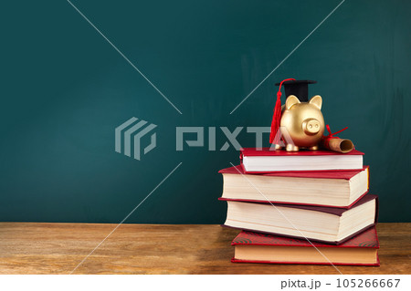 hat graduation model on pigybank for concept investment education and scholarships hat graduation model on pigybank for concept investment education and scholarships 105266667