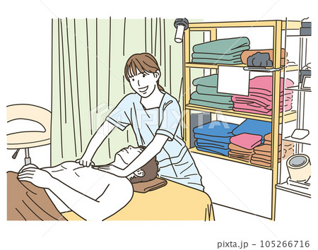 男性に施術をする若いエスティシャンの女性 105266716