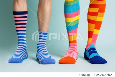 Sock's on feet in different colors Sock's on feet in different colors 105267702