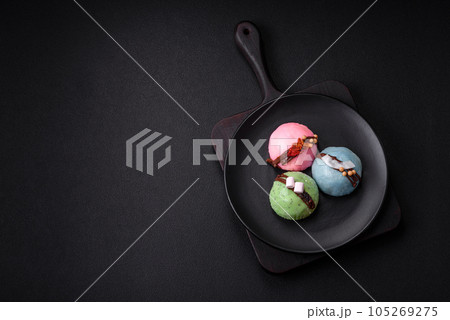 Delicious sweet colorful mochi desserts or ice cream with rice dough and toppings 105269275