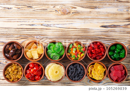 Group of dried and candied fruit in bowl Group of dried and candied fruit in bowl 105269839