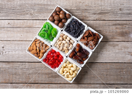 Mix of dried and candied fruits and nuts Mix of dried and candied fruits and nuts 105269860