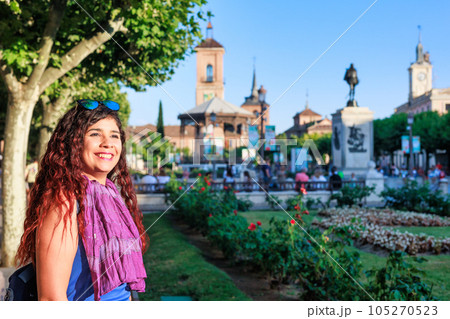 Plaza de Cervantes in Alcala de Henares tourism heritage. Hispanic mid-female journey confident Plaza de Cervantes in Alcala de Henares tourism heritage. Hispanic mid-female journey confident 105270523