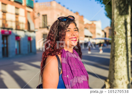 Plaza de Cervantes in Alcala de Henares tourism heritage. Hispanic mid-female journey confident Plaza de Cervantes in Alcala de Henares tourism heritage. Hispanic mid-female journey confident 105270538