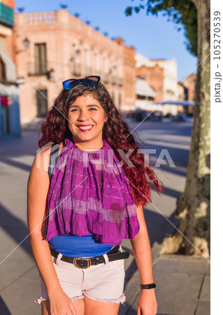 Plaza de Cervantes in Alcala de Henares tourism heritage. Hispanic mid-female journey confident Plaza de Cervantes in Alcala de Henares tourism heritage. Hispanic mid-female journey confident 105270539