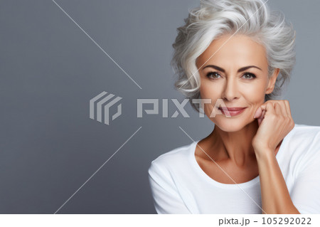 Beautiful mid aged gorgeous mature woman. Healthy face skin care beauty skincare cosmetic with copy space. Beautiful mid aged gorgeous mature woman. Healthy face skin care beauty skincare cosmetic with copy space. 105292022