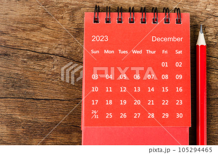 The Red December 2023 Monthly desk calendar for 2023 year with pencil on wooden background. The Red December 2023 Monthly desk calendar for 2023 year with pencil on wooden background. 105294465