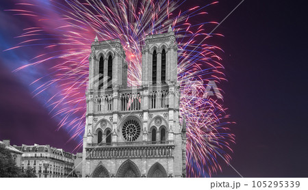 Celebratory fireworks over the Notre Dame de Paris, also known as Notre Dame Cathedral or simply Notre Dame, is a Gothic, Roman Catholic cathedral of Paris, France 105295339