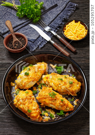 baked chicken breasts under cracker cheese crust baked chicken breasts under cracker cheese crust 105295707