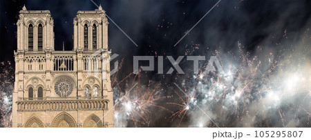 Celebratory fireworks over the Notre Dame de Paris, also known as Notre Dame Cathedral or simply Notre Dame, is a Gothic, Roman Catholic cathedral of Paris, France 105295807