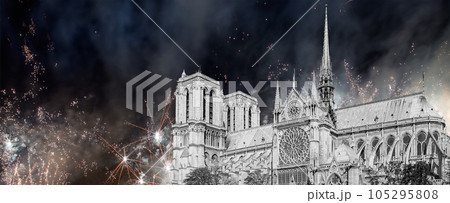 Celebratory fireworks over the Notre Dame de Paris, also known as Notre Dame Cathedral or simply Notre Dame, is a Gothic, Roman Catholic cathedral of Paris, France 105295808
