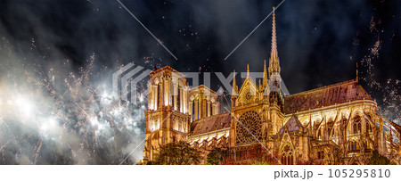 Celebratory fireworks over the Notre Dame de Paris, also known as Notre Dame Cathedral or simply Notre Dame, is a Gothic, Roman Catholic cathedral of Paris, France 105295810