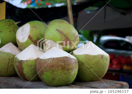 Whole coconut fruits pile. 105296157