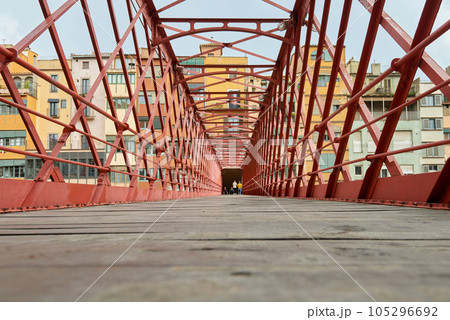 Bridge in Girona, Catalonia, Spain: Eiffel Bridge constructed by Gustave Eiffel over the Onyar River in Girona, Catalonia, Spain. 105296692