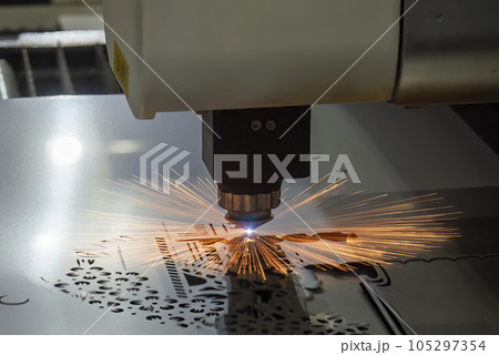 The fiber laser cutting machine cutting  machine cut the metal plate. 105297354