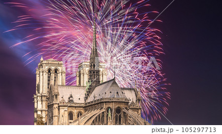 Celebratory fireworks over the Notre Dame de Paris, also known as Notre Dame Cathedral or simply Notre Dame, is a Gothic, Roman Catholic cathedral of Paris, France Celebratory fireworks over the Notre Dame de Paris, also known as Notre Dame Cathedral or simply Notre Dame, is a Gothic, Roman Catholic cathedral of Paris, France 105297713
