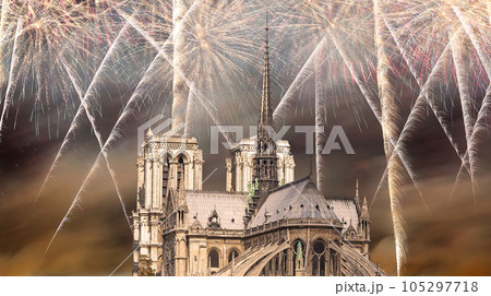 Celebratory fireworks over the Notre Dame de Paris, also known as Notre Dame Cathedral or simply Notre Dame, is a Gothic, Roman Catholic cathedral of Paris, France Celebratory fireworks over the Notre Dame de Paris, also known as Notre Dame Cathedral or simply Notre Dame, is a Gothic, Roman Catholic cathedral of Paris, France 105297718