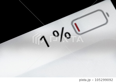 Smartphone charged battery level indicator - one, 1 percent: close up macro 105299092