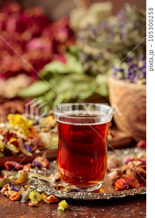 Herbal tea and a mix of various dried medicinal plants and herbs. 105300258