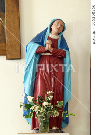 Virgin Mary under the cross, statue in the parish church of St. Michael the Archangel in Mihovljan, Croatia Virgin Mary under the cross, statue in the parish church of St. Michael the Archangel in Mihovljan, Croatia 105300556
