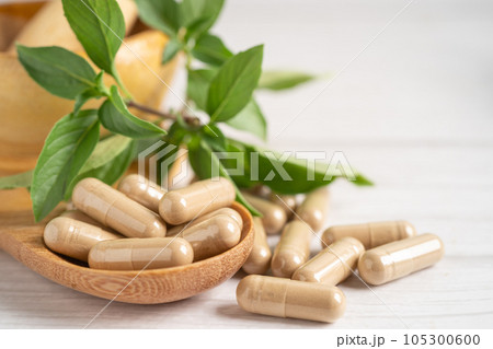 Alternative medicine herbal organic capsule with vitamin E omega 3 fish oil, mineral, drug with herbs leaf natural supplements for healthy good life. 105300600