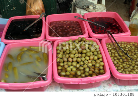 Sale of pickles in the souq of the Muslim Quarter in the Old City of Jerusalem, IL. Sale of pickles in the souq of the Muslim Quarter in the Old City of Jerusalem, IL. 105301189