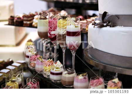 Colorful desserts and pastry served on a wedding party 105301193