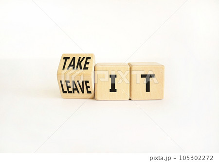 Take or leave it symbol. Businessman turns wooden cubes and changes words Leave it to Take it. Beautiful white table white background. Copy space. Business and take or leave it concept. Take or leave it symbol. Businessman turns wooden cubes and changes words Leave it to Take it. Beautiful white table white background. Copy space. Business and take or leave it concept. 105302272