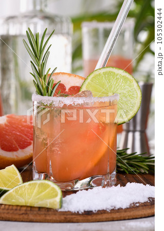 Cocktail Pink Paloma is grapefruit and tequila 105302444