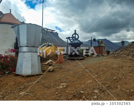 Giant coffee machines at Molino de Viento near Mogan, Gran Canaria, Spain. 105302565