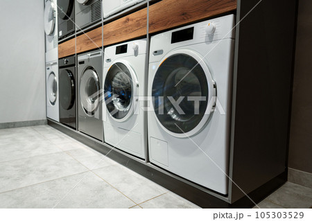 Washing machines and drying machines home appliance retail store showroom 105303529