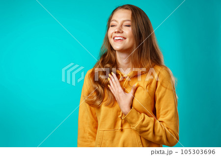 Young attractive cheerful girl laughing with joy 105303696