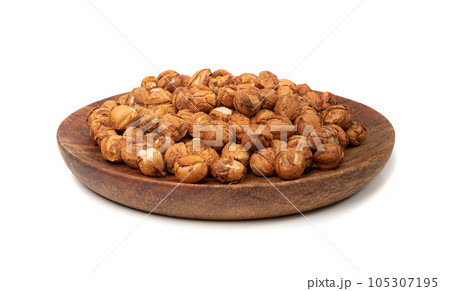 Nut Kernels, Hazelnuts Pile on Plate Isolated, Healthy Organic Nuts Group, Nut Kernels on White Nut Kernels, Hazelnuts Pile on Plate Isolated, Healthy Organic Nuts Group, Nut Kernels on White 105307195