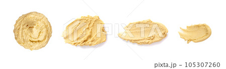Hummus Smear Isolated, Houmous Dip, Tahini Sauce, Hummus Spread on White Background Hummus Smear Isolated, Houmous Dip, Tahini Sauce, Hummus Spread on White Background 105307260