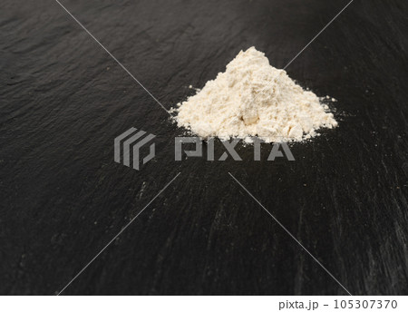 Flour Texture Background, Wheat Flour Pattern with Copy Space, Bakery Banner Mockup, Black Table Plate Flour Texture Background, Wheat Flour Pattern with Copy Space, Bakery Banner Mockup, Black Table Plate 105307370