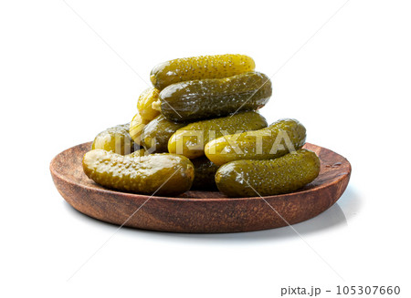 Pickled Cucumbers on Wood Plate Isolated, Fermented, Marinated Vegetables, Gherkins 105307660