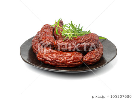 Dry Smoked Sausages Isolated, Salami Sticks, Kielbasa, Cabanossi, Kabanos, Dry Embutido, Chorizo, Bratwurst Dry Smoked Sausages Isolated, Salami Sticks, Kielbasa, Cabanossi, Kabanos, Dry Embutido, Chorizo, Bratwurst 105307680