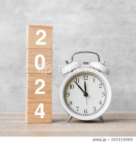 Happy New Year with vintage alarm clock and 2024 block. Christmas, New Start, Resolution, countdown, Goals, Plan, Action and Motivation Concept Happy New Year with vintage alarm clock and 2024 block. Christmas, New Start, Resolution, countdown, Goals, Plan, Action and Motivation Concept 105314069