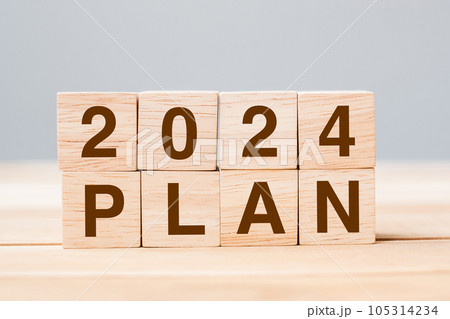 block 2024 PLAN text on table. Resolution, strategy, goal, motivation, reboot, business and New Year holiday concepts 105314234