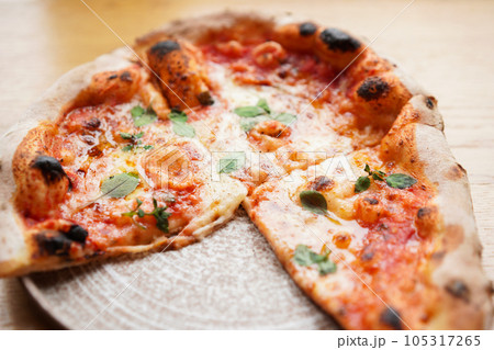 Pizza without one piece in the box. fast delivery of food. packaging for fast food. top view 105317265